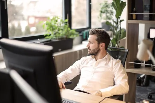 Он сейчас на работе. — He is at work now