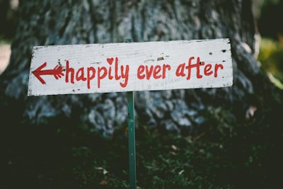 Unhappily — tristement